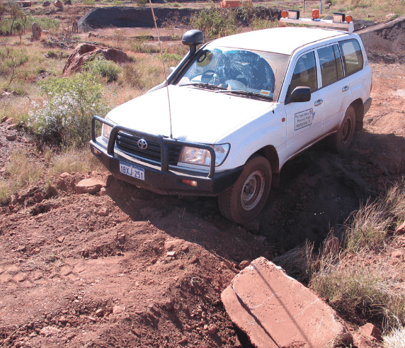 4WD off roading traveling across dry earth as part of Saferights 4WD training course.