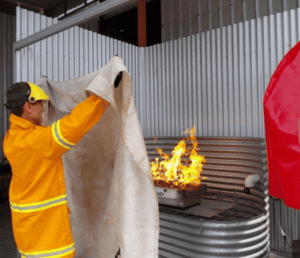 Saferight trainer doing a demonstration on FIRE SAFETY TRAINING in a confined space for Saferights confided space fire safety course.