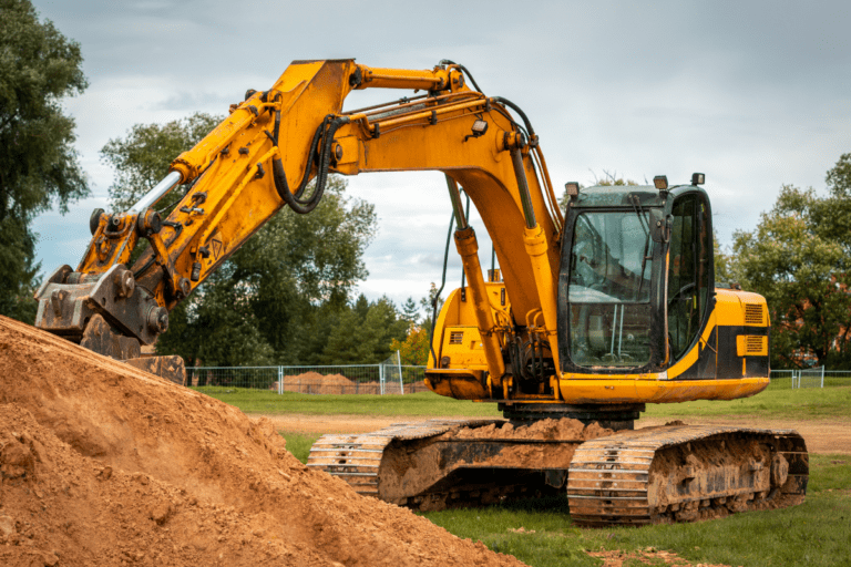 conduct hydraulic excavator operations. Yellow hydraulic excavator in action, digging through soil on a construction site while doing Excavator Training course in Perth WA to Earn an Excavator Ticket.