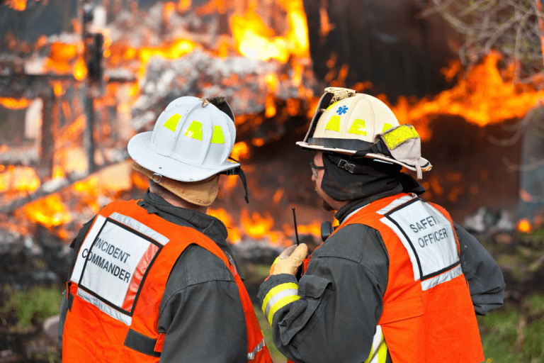 Fire Warden Training Perth - Fire Safety Training Session. Two incident commanders communicating and assessing a fire.