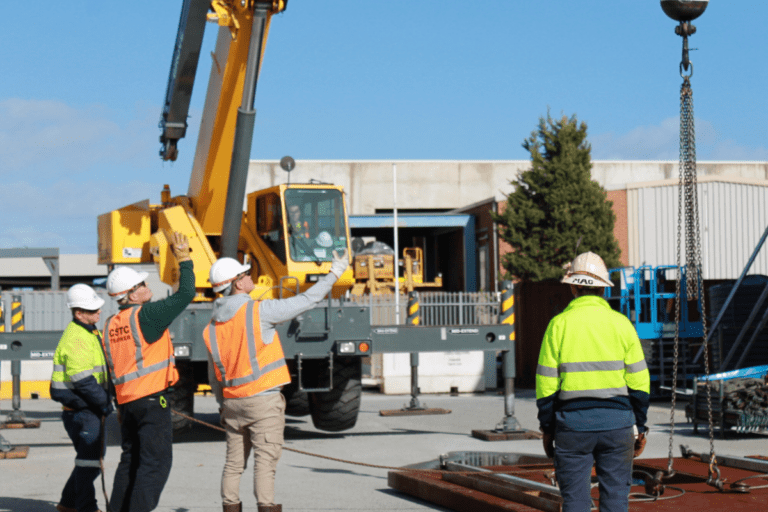 Group of Rigging trainees at Saferight operating a crane at Saferights Perth Training facility.