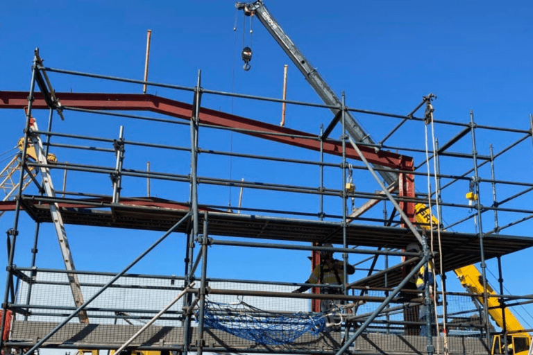 Multileveled platform scaffold being built by Scaffolding course trainees at Saferights training facility.